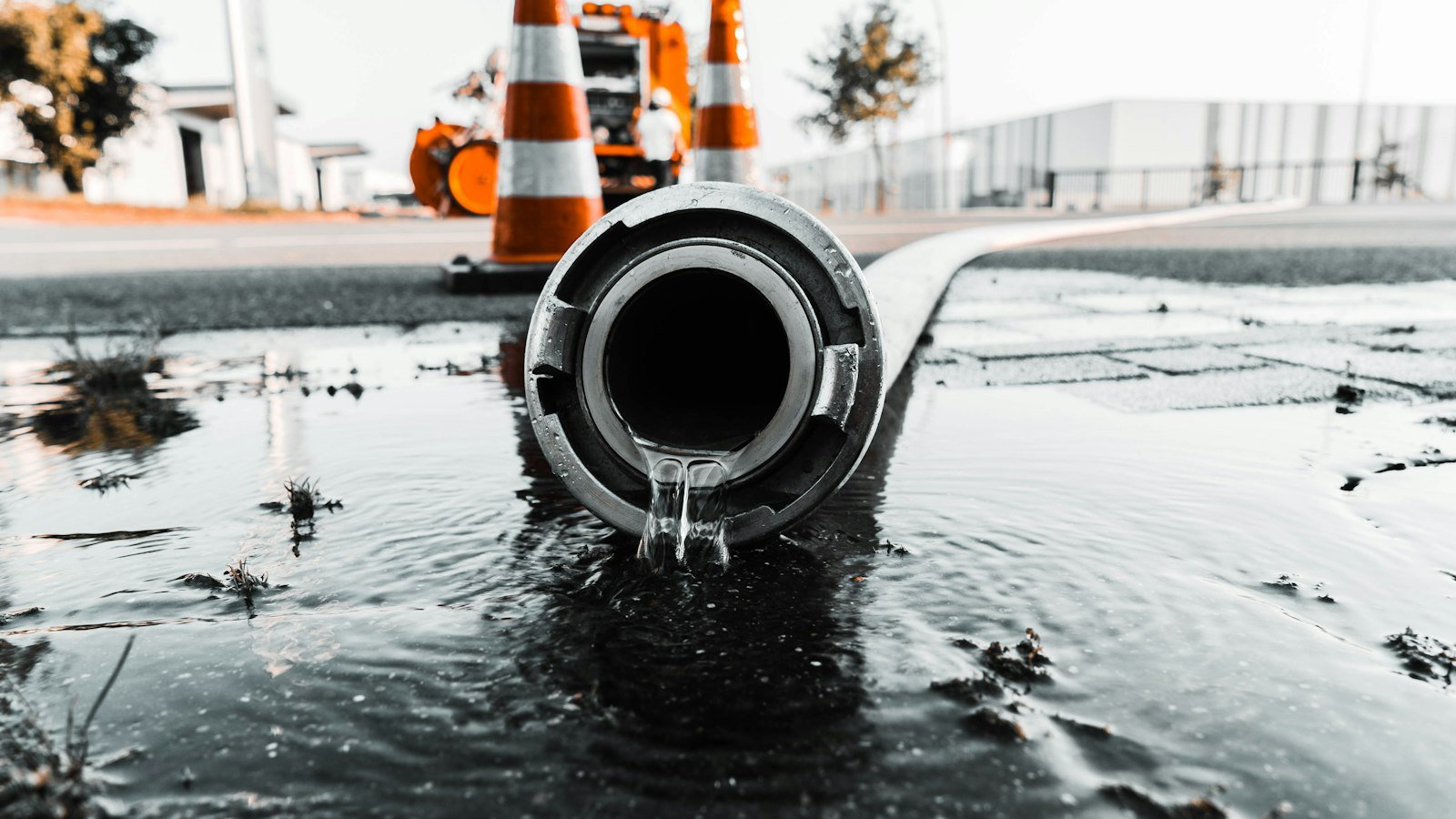 Water pouring out of a broken pipe